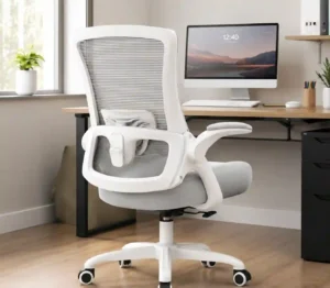 A white and gray ergonomic office chair with a breathable mesh back, lumbar support, padded armrests, cushioned seat, and adjustable base positioned at a modern home office desk.