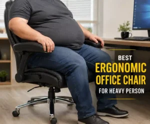A heavy person sitting comfortably in a spacious ergonomic office chair at a modern home office desk, highlighting the importance of proper seat support, room, and ergonomic design for heavier users.